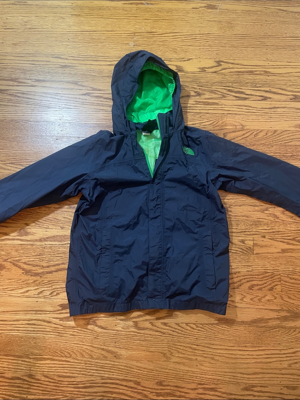 The North Face Navy Kids Rain Jacket with Bright Green Hood Lining